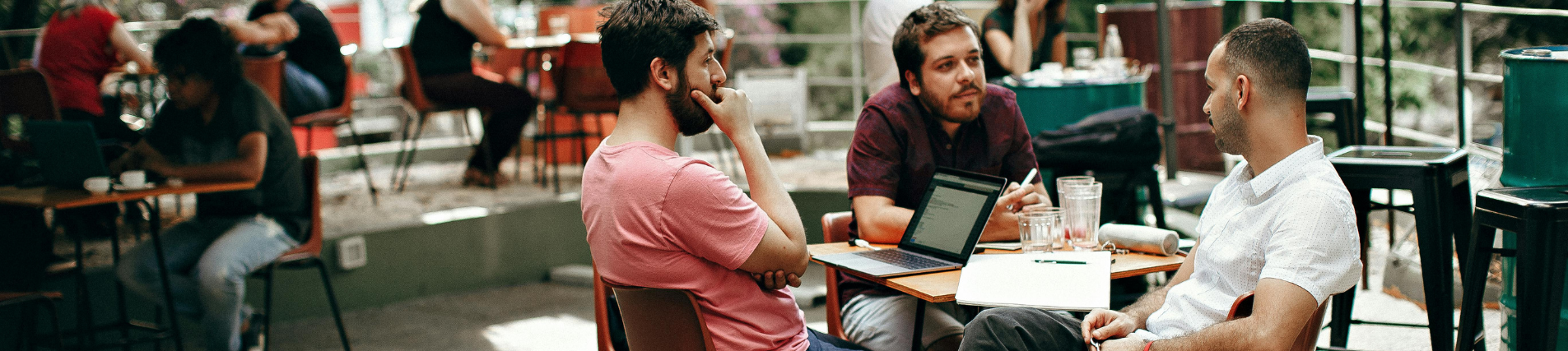 The slitter is slitting the wire cloth into strips.
